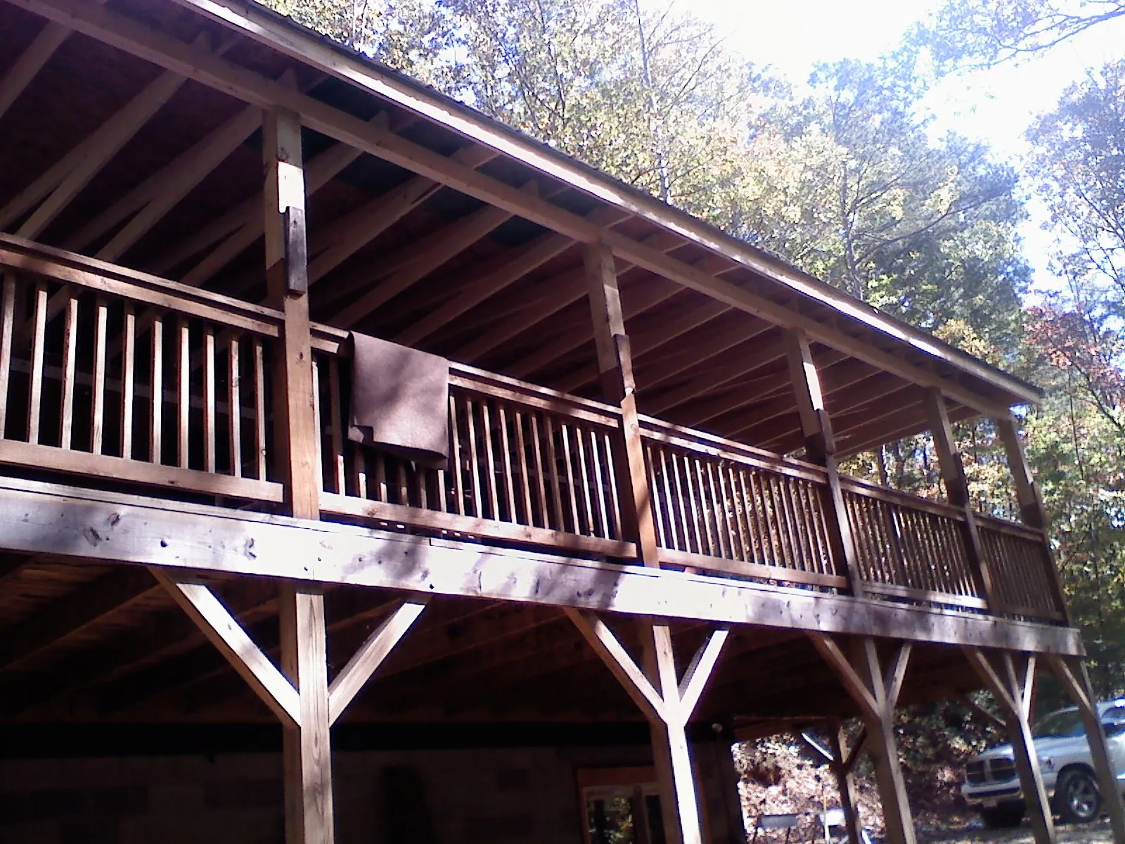 Timber framing under a new elevated porch and deck — Roof Leak Repair in Hays by Roofing Brothers